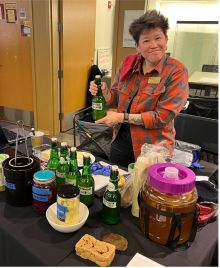 Photo of Guest Speaker Sarah Ku Cooking in Her Kitchen